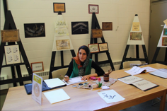 Ati Zar sitting at a table
