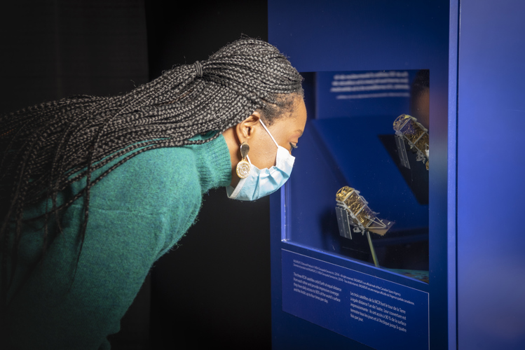 Woman looking at artifact